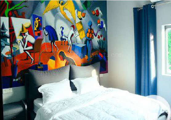 德化对于酒店的墙体彩绘而言更注重哪些方面？